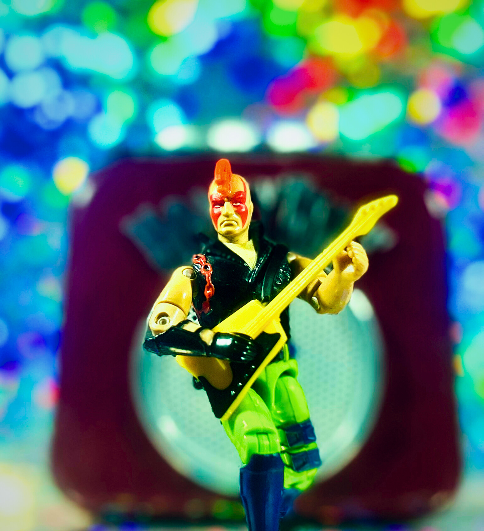 1993 GI Joe Zartan (Ninja Force) playing an electric guitar in front of a large amp